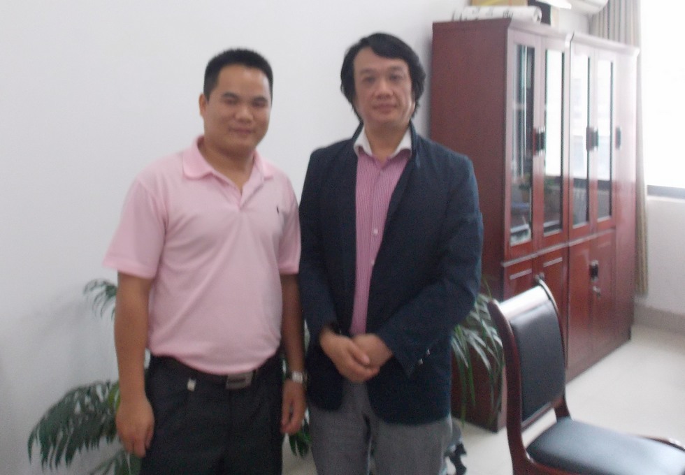 罗敏教师和扬洲大学旅游烹饪学院周晓燕副院长合影.jpg