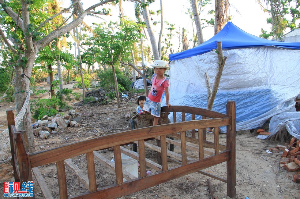 文昌内六村灾后重建试点村   24间房屋同时施工年底建成。（周宗贵 摄） (8).jpg