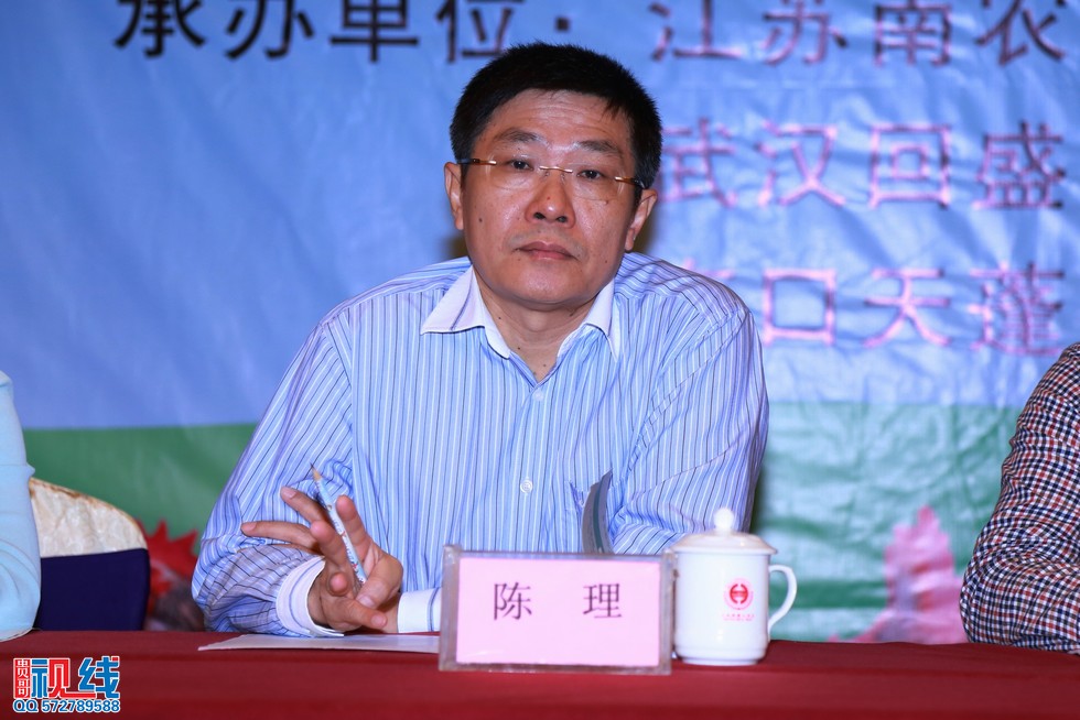 海南省畜牧业协会2014年年会暨第二届健康养猪论坛现场实况。（周宗贵 摄） (18).jpg
